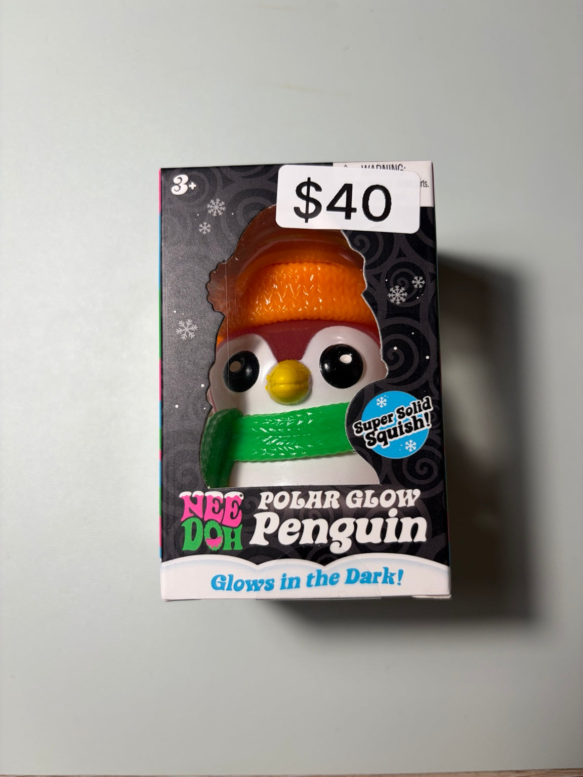 NeeDoh Polar Glow Penguin Orange Cap